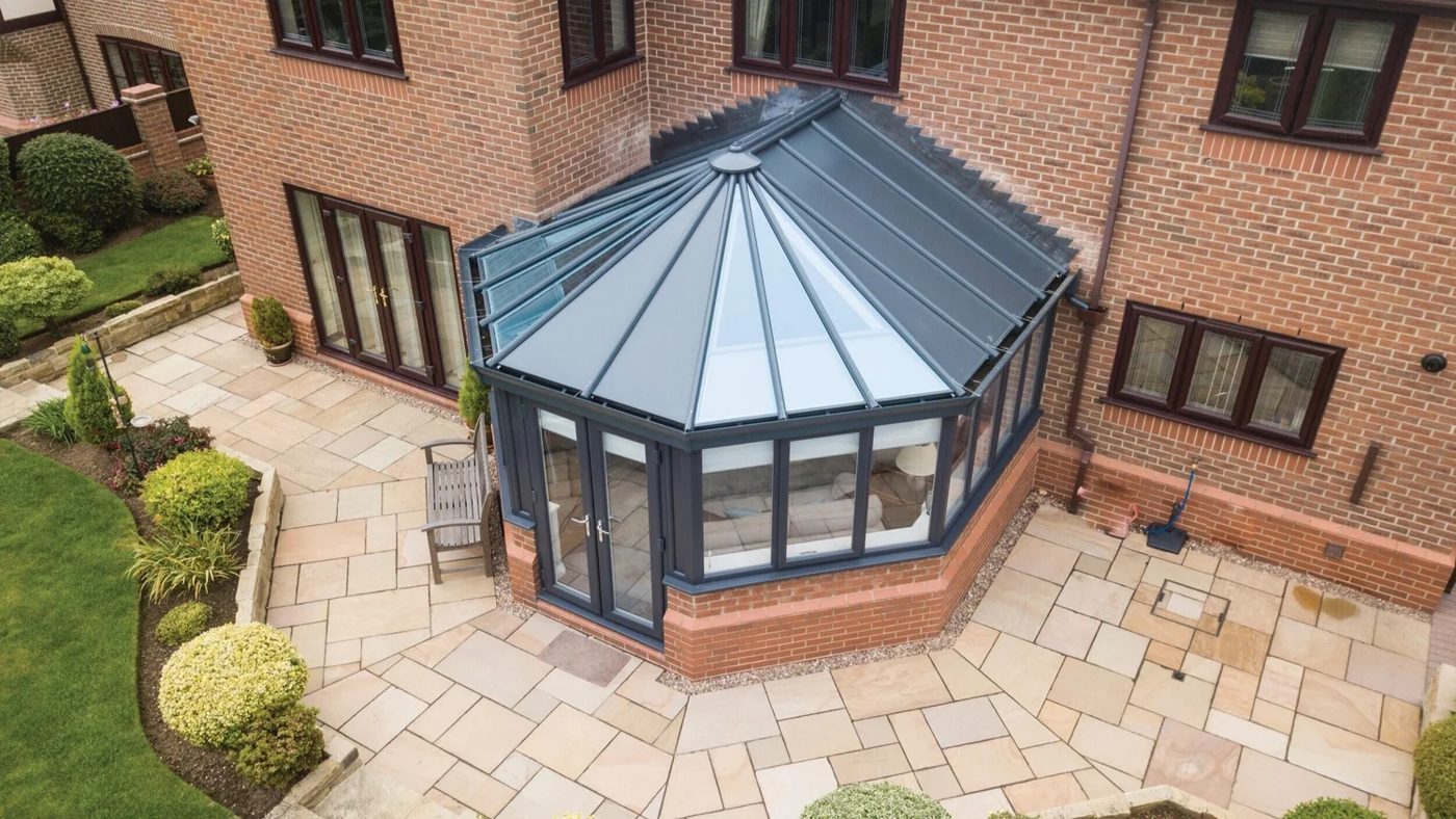 Victorian-style glass conservatory roof in anthracite grey